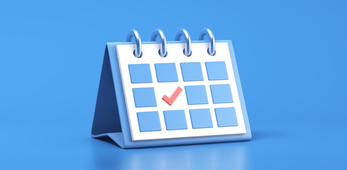 A calendar with a check on a day.