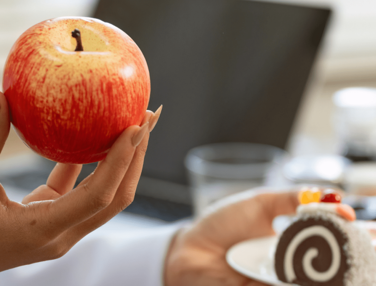 Someone holding an apple