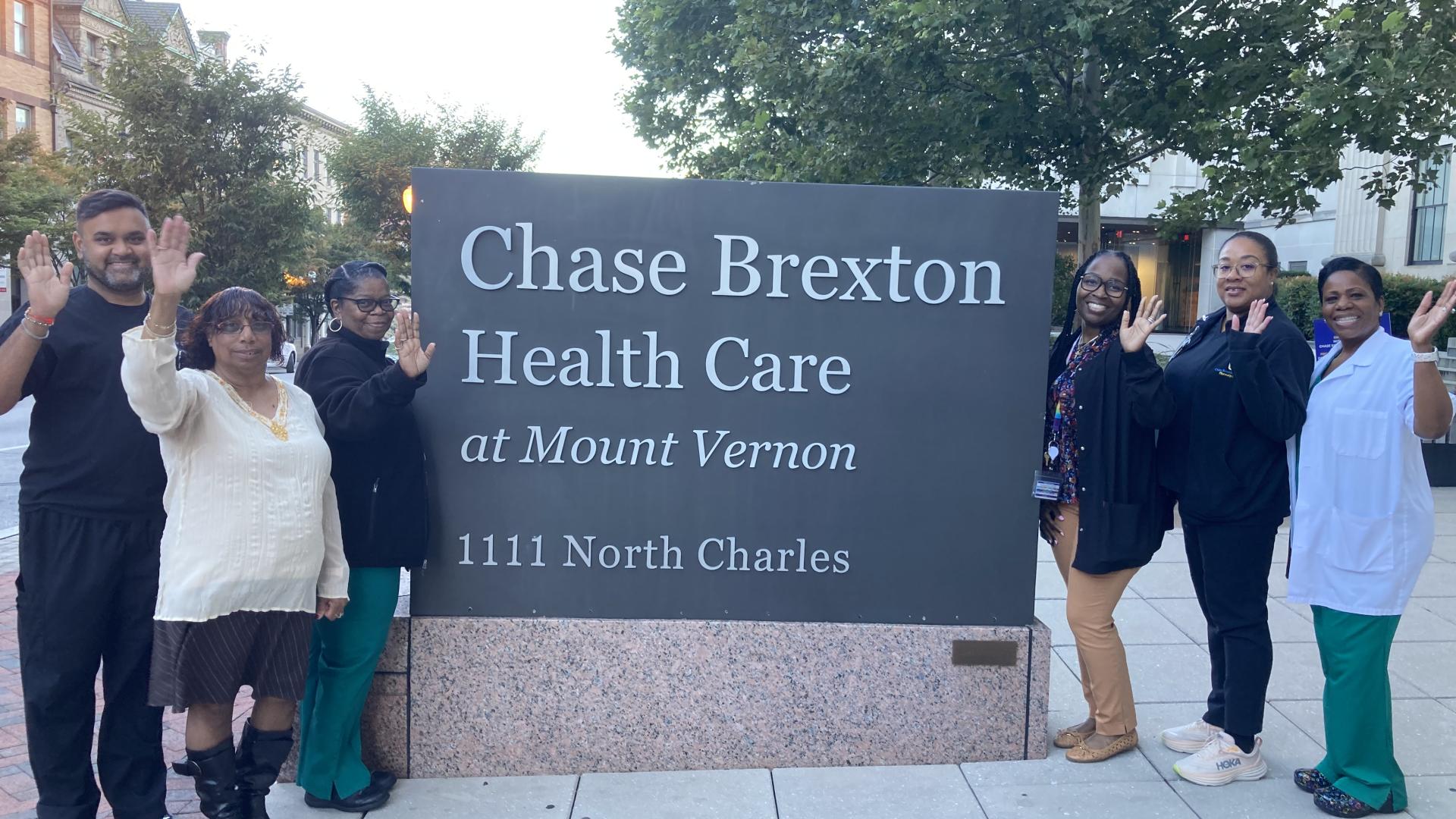 MVC Pharmacy staff waving outside