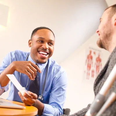 Male doctor with a patient
