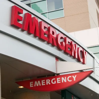 Red emergency sign on a hospital