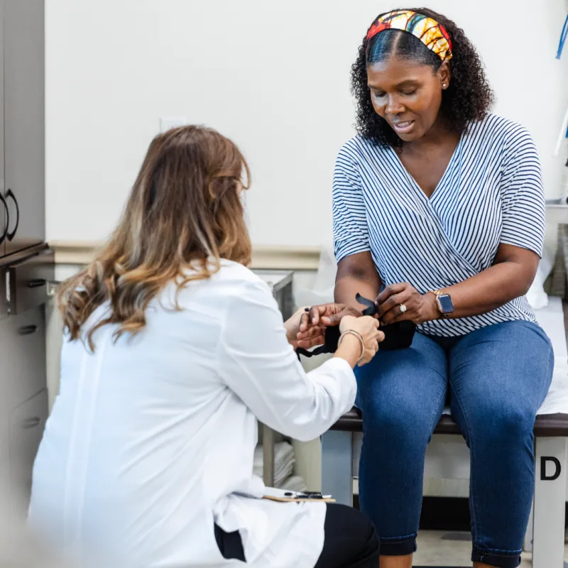 Doctor working with a patient's hand