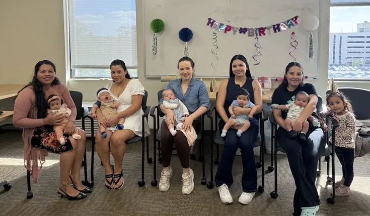 Women holding their babies